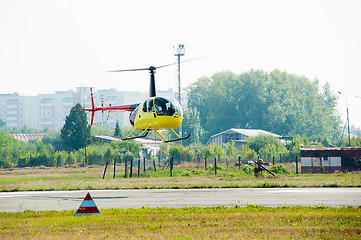 Image showing Pilot of Eurocopter AS-350 on airshow