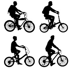 Image showing Set silhouette of a cyclist male and female.  vector illustratio