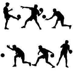 Image showing Set silhouettes of soccer players with the ball. Vector illustra