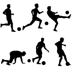 Image showing Set silhouettes of soccer players with the ball. Vector illustra