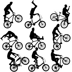 Image showing Set silhouette of a cyclist male and female.  vector illustratio