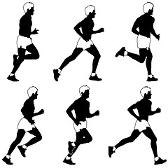 Image showing Set of silhouettes. Runners on sprint, men. vector illustration.