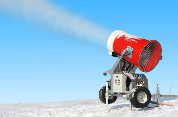 Image showing Snowmaking is the production of snow  on ski slopes. 