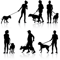 Image showing Silhouettes of people and dogs. Vector illustration.