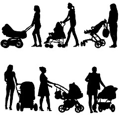 Image showing Silhouettes  walkings mothers with baby strollers. Vector illust