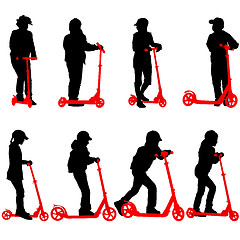 Image showing Set of silhouettes of children riding on scooters. Vector illust