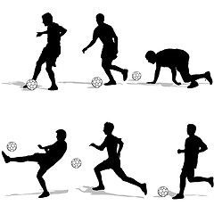 Image showing Set silhouettes of soccer players with the ball. Vector illustra