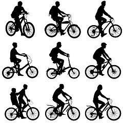 Image showing Set silhouette of a cyclist male and female.  vector illustratio