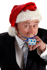 Image showing Business Santa and noisemaker