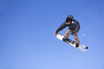 Image showing Snowboarder Jumping