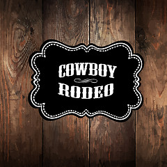 Image showing Wooden background with wild west styled label