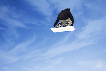 Image showing Extreme Jumping snowboarder