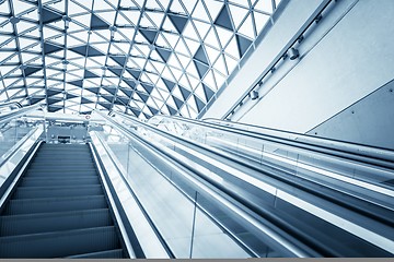 Image showing Moving escalator in the business center