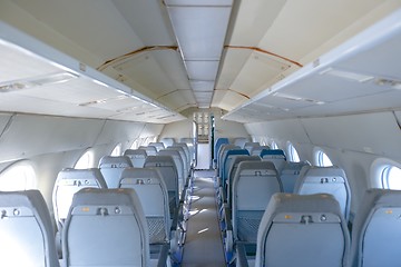 Image showing Interior of an airplane with many seats