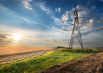 Image showing Electric pole in the field