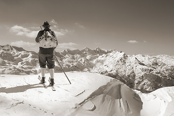 Image showing Sepia Vintage skier with wooden skis