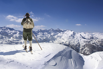 Image showing Vintage skier with wooden skis