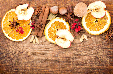 Image showing Christmas spices and dried orange sliceson 