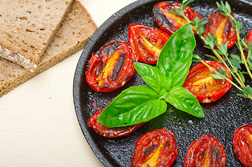 Image showing baked cherry tomatoes with basil and thyme