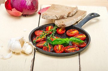 Image showing baked cherry tomatoes with basil and thyme