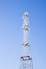 Image showing Radio mast on blue frosty winter sky