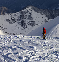 Image showing Skier on off-piste slope in sunny evening