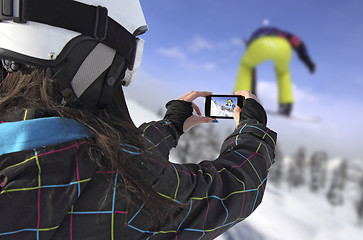 Image showing Photographed snowboarder jump with smart phone