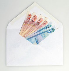 Image showing Ruble money in white envelope 