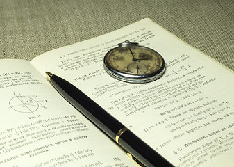 Image showing Classbook, pen and old watches