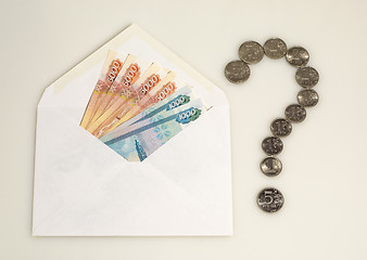 Image showing Money in envelope and question mark from coins