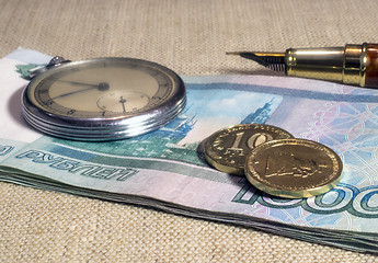 Image showing Business still-life with money and watch