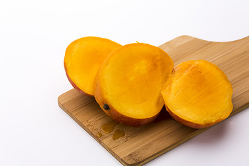 Image showing Mango Cut Into Three Equal Slices