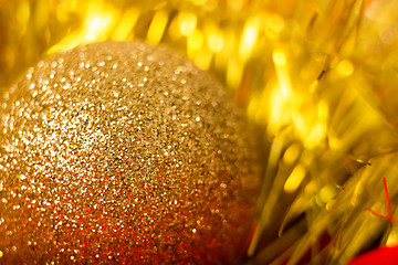 Image showing golden ball and tinsel. macro