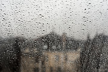 Image showing Natural water drops on glass