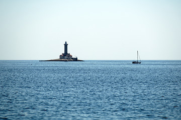 Image showing Old lighthouse on a rock island