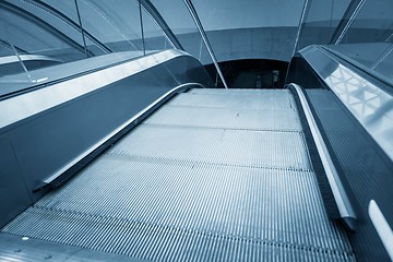 Image showing Moving escalator in the business center