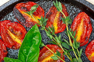 Image showing baked cherry tomatoes with basil and thyme