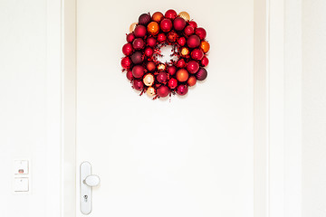 Image showing Christmas wreath on entrance door