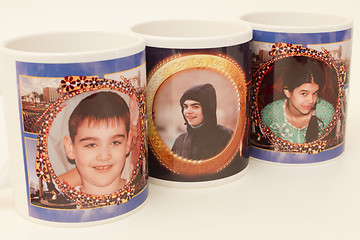 Image showing Portraits on glasses.
