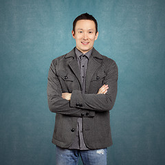 Image showing Asian Man With Folded Hands