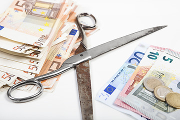 Image showing monetary scissors come apart