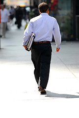 Image showing Businessman walking