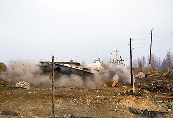 Image showing bomb explosion at the facility of  power line