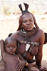 Image showing Himba woman with child,in the village