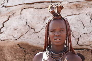 Image showing Himba woman with ornaments on the neck in the village