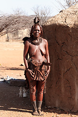 Image showing Himba woman with ornaments on the neck in the village