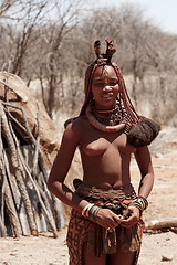 Image showing Himba woman with ornaments on the neck in the village