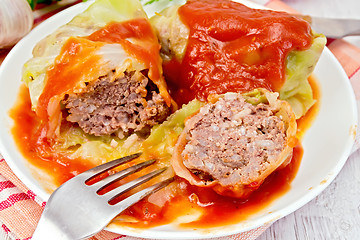 Image showing Cabbage stuffed with tomato sauce on napkin