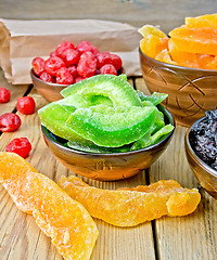 Image showing Candied pomelo and fruit in bowl on board