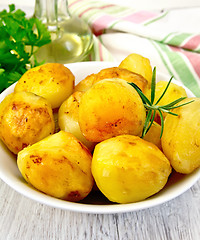 Image showing Potatoes fried in plate on board